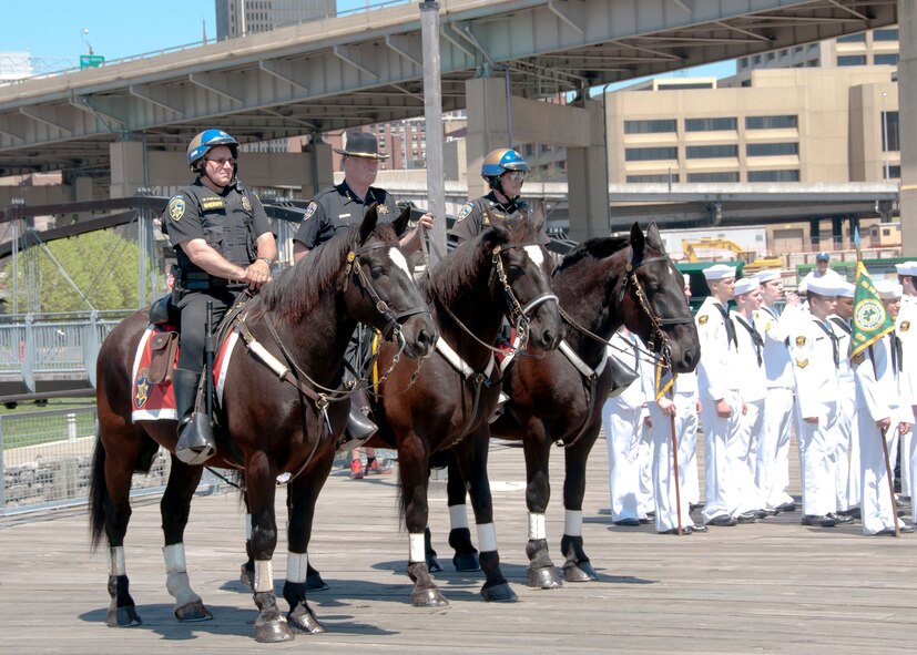 Military members from the five branches of the United States Military, local political leaders, and members of the general public were on hand for the 53nd annual Greater Western New York Armed Forces Week opening ceremony held at the Erie Canal Harbor, May 5, 2013, Buffalo, NY. The Opening Ceremony hosted by the U.S. Navy included music by the American Legion Band of the Tonawandas and Color Guards from throughout WNY. (U.S. Air Force photo by Tech. Sgt. Joseph McKee)