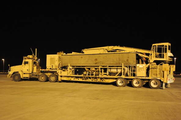 An 87,000 pound Granutech Mobile Rotogrind Shredder Model 525 HP is moved into position for loading May 8, 2013 at an undisclosed airfield, Southwest Asia. (U.S. Air Force photo/Senior Master Sgt. George Thompson)
