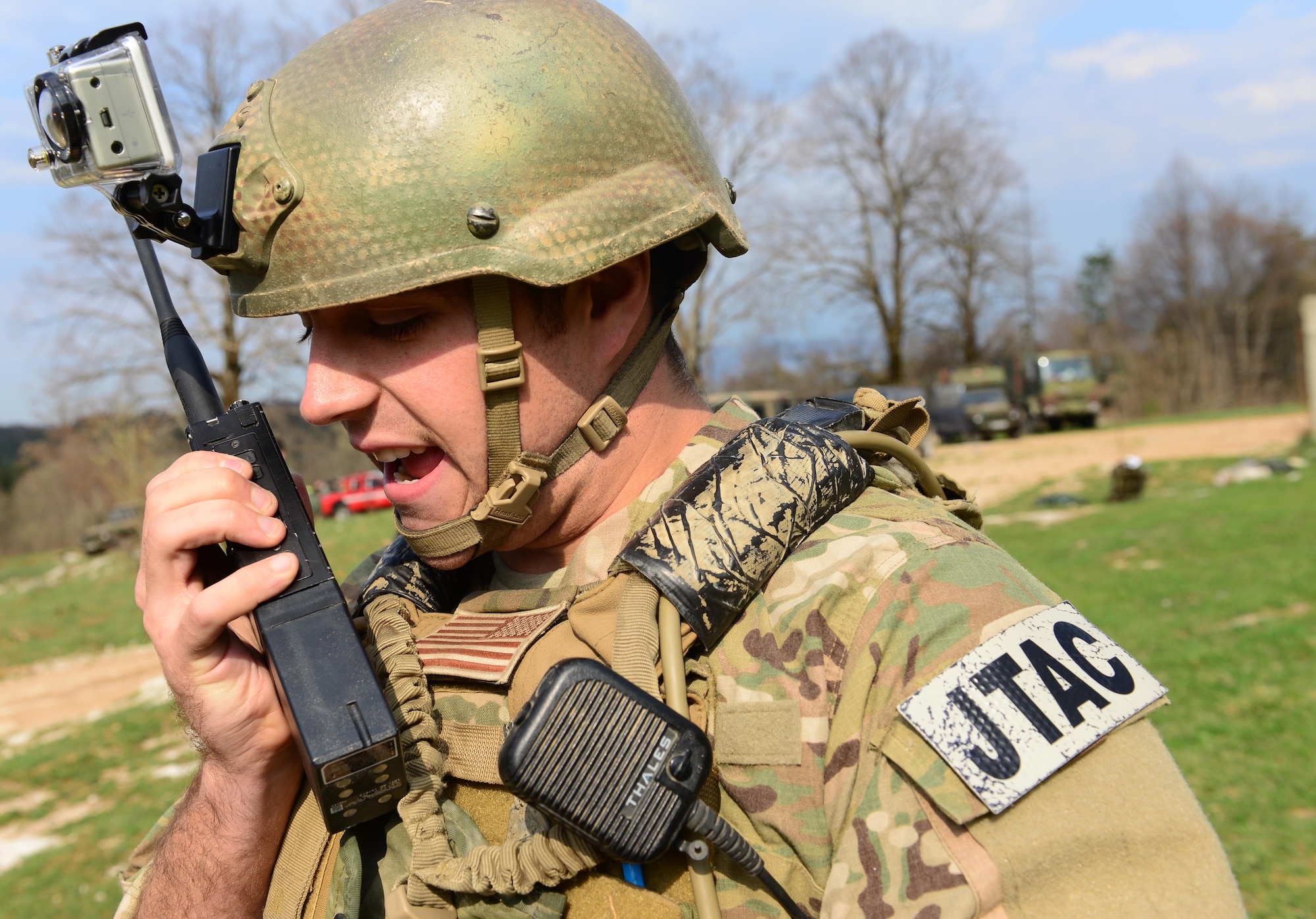 First Lt. Patrick Bonner, 8th Air Support Operations Squadron tactical air control party air liaison officer, radios a Slovenian pilot April 19, 2013, at a training range in Pocek, Slovenia. TACPs are certified tactical air control party members, who radio in and coordinate airstrikes as needed. (U.S. Air Force photo/Airman 1st Class Matthew Lotz)