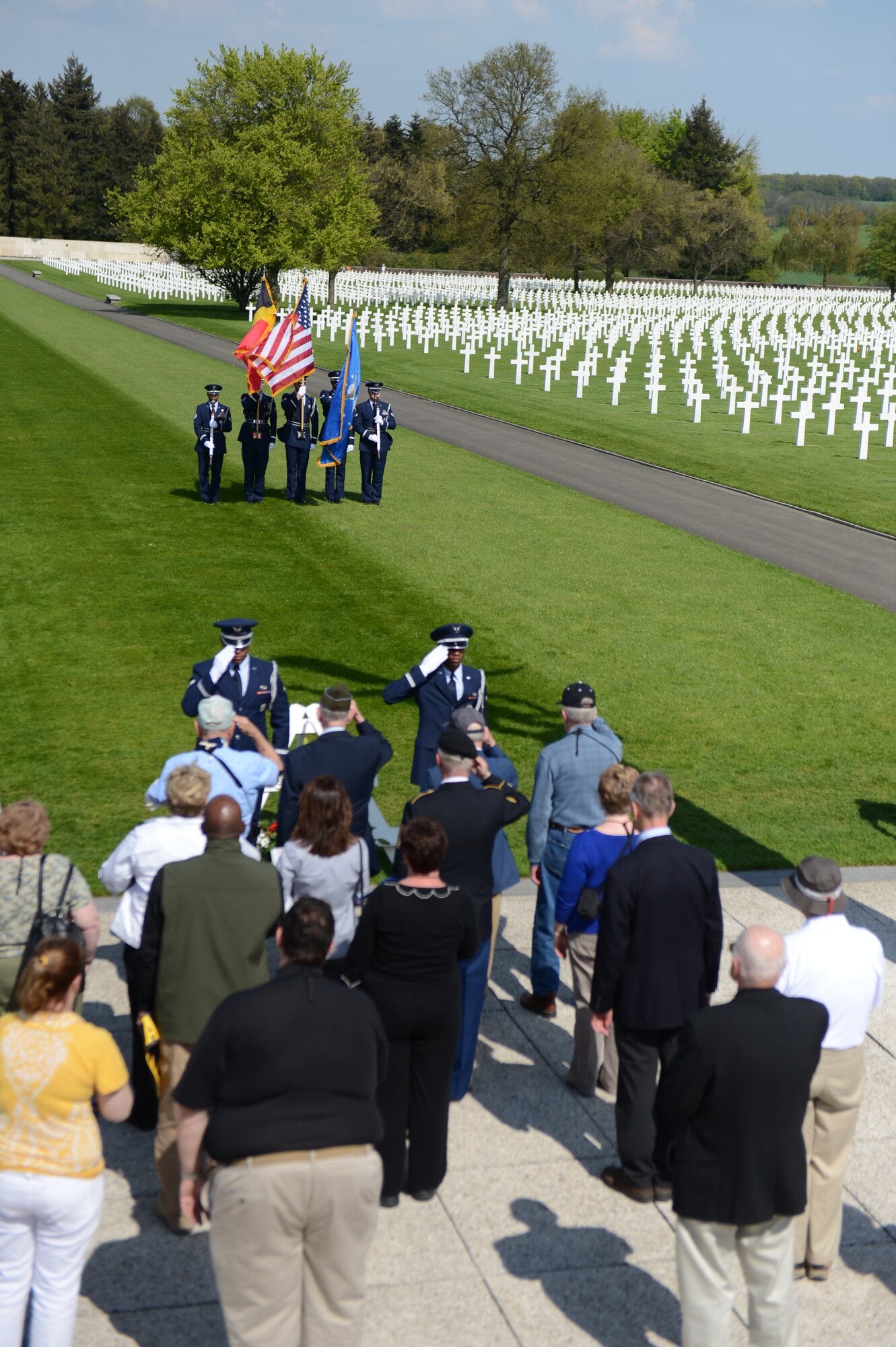 SPANGDAHLEM AIR BASE, Germany – Members of the Spangdahlem honor guard and 104th Infantry Division tour members honor fallen service members at the Henri-Chapelle American Cemetery and Memorial in Belgium May 6, 2013. The honor guard members participated in the ceremony to pay respect to the U.S. service members who died in World War II. (U.S. Air Force photo by Airman 1st class Gustavo Castillo/Released) 