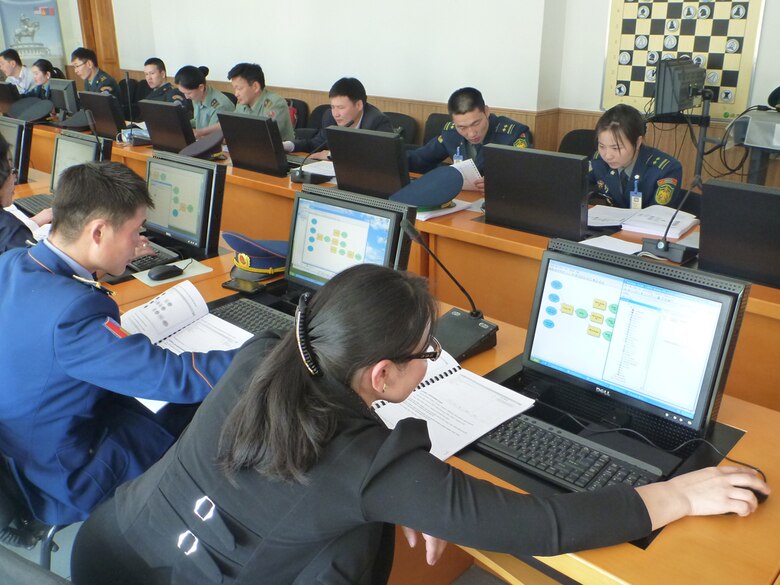 Representatives from the Mongolian Armed Forces explore interpolated raster surfaces at the Advanced Geographic Informatin Systems (GIS)Workshop. The U.S. Army Corps of Engineers led the instruction at the U.S, Pacific Command-sponsored workshop, which was the third in a series of GIS exchanges that have coupled subject matter experts from Mongolia and the United States.