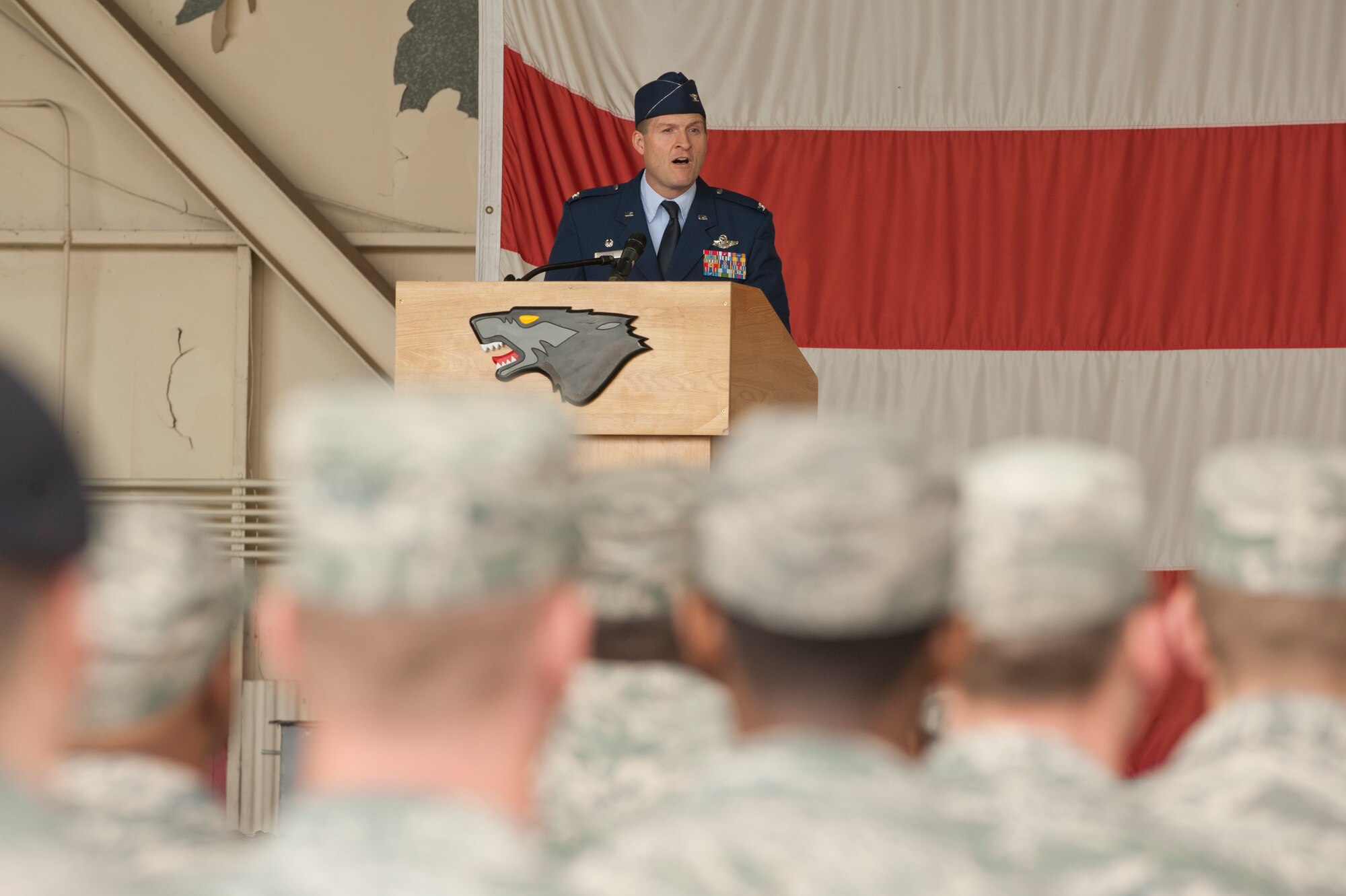 KUNSAN AIR BASE, Republic of Korea -- Col. S. Clinton Hinote, 8th Fighter Wing commander, speaks to Wolf Pack members during the wing change of command at Kunsan Air Base, Republic of Korea, May 10, 2013. Hinote was the deputy director of requirements at Headquarters Air Combat Command, Langley Air Force Base, Va., before assuming command of the 8th FW. (U.S. Air Force photo by Staff Sgt. Jonathan Fowler/Released)