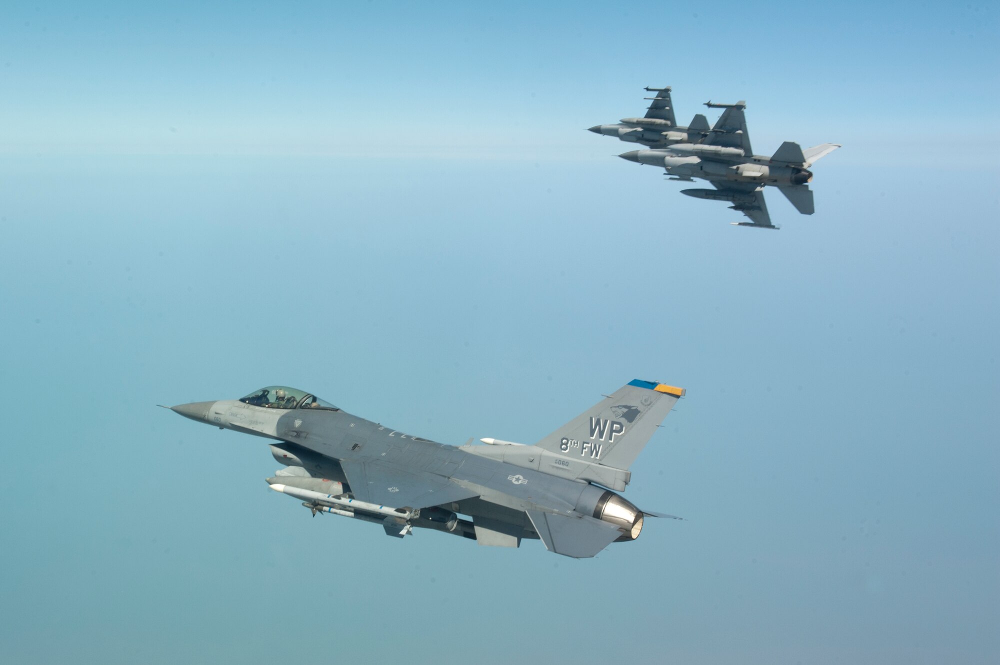 Pilots from the Republic of Korea 38th Fighter Group break away from formation with Col. John Pearse, 8th Fighter Wing commander, during a friendship flight over the South Korean Peninsula, May 1, 2013. The pilots practiced dog fighting and identifying enemy targets. (U.S. Air Force photo by Senior Airman Marcus Morris/Released)