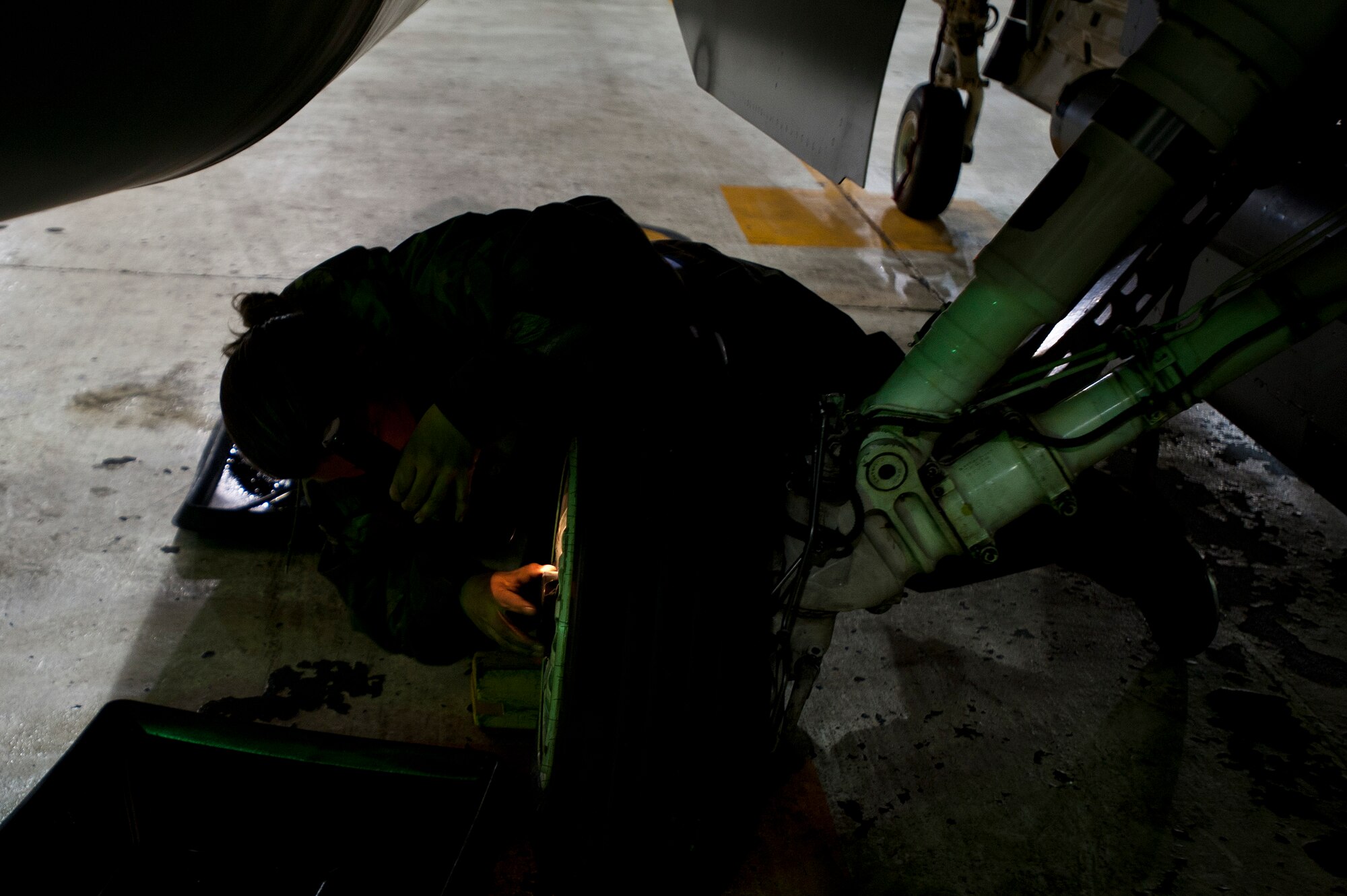 KUNSAN AIR BASE, Republic of Korea – Staff Sgt. Terrelle Sayles, front, 8th Maintenance Operations Squadron, load standardization team chief installs a wing fin, while Senior Airman Kevin Johnson, 8th MOS load standardization 2-man, installs a tail fin on a AIM-9X Sidewinder missile during exercise Beverly Bearcat 13-1, at Kunsan Air Base, Republic of Korea, April 10, 2013. 7th Air Force Inspector Generals, foreground, evaluated the weapons loaders on their duties during the 2013 Pacific Air Force Readiness Inspection.  (U.S. Air Force photo by Staff Sgt. Tong Duong/ Released)