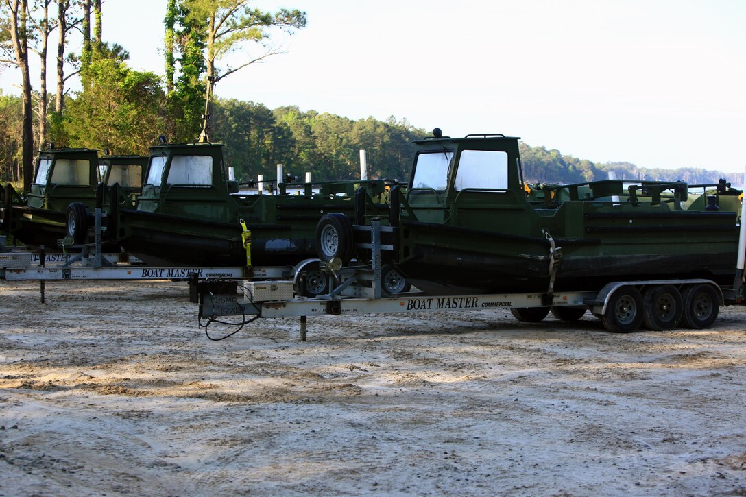 MK III Bridge Erection Boats belonging to 8th Engineer Support Battalion, 2nd Marine Logistics Group sit at Engineer Point aboard Camp Lejeune, N.C., May 7, 2013. Approximately 15 soldiers with the Bermuda Regiment were instructed by Marines with 8th ESB to practice longitudinal and conventional rafting using MK III BEBs when building and using Improved Ribbon Bridges.