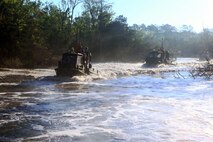 Marines with 8th Engineer Support Battalion, 2nd Marine Logistics Group demonstrate for soldiers with the Bermuda Regiment how to operate the MK III Bridge Erection Boats during Exercise Island Warrior aboard Camp Lejeune, N.C., May 8, 2013. After classes about the nomenclature and characteristics of the MK II BEB, the soldiers of the Bermuda Regiment went out on the water and performed practical applications under the supervision of Marine Corps operators. 