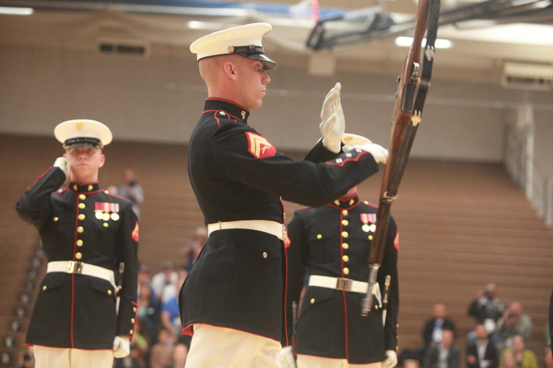 The Silent Drill Platoon from Marine Barracks Washington perform aboard the U.S. Olympic Training Center in Colorado Springs, Colo., May 11. The platoon performed following the opening ceremony of the 2013 Warrior Games, a Paralympic-style competition where more than 260 wounded, ill or injured service members and veterans will compete for gold in archery, swimming, wheelchair basketball, sitting volleyball, track and field and cycling. The Warrior Games provides athletes an opportunity to fine tune their athletic skills, strengthen their bodies and support each other through their recovery process.