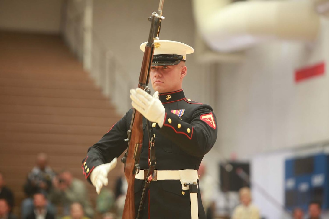 The Silent Drill Platoon from Marine Barracks Washington perform aboard the U.S. Olympic Training Center in Colorado Springs, Colo., May 11. The platoon performed following the opening ceremony of the 2013 Warrior Games, a Paralympic-style competition where more than 260 wounded, ill or injured service members and veterans will compete for gold in archery, swimming, wheelchair basketball, sitting volleyball, track and field and cycling. The Warrior Games provides athletes an opportunity to fine tune their athletic skills, strengthen their bodies and support each other through their recovery process.