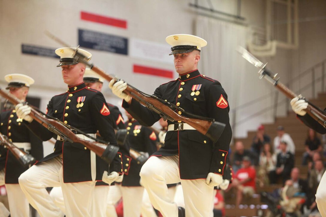 The Silent Drill Platoon from Marine Barracks Washington, perform aboard the U.S. Olympic Training Center in Colorado Springs, Colo., May 11. The platoon performed following the opening ceremony of the 2013 Warrior Games, a Paralympic-style competition where more than 260 wounded, ill or injured service members and veterans will compete for gold in archery, swimming, wheelchair basketball, sitting volleyball, track and field and cycling. The Warrior Games provides athletes an opportunity to fine tune their athletic skills, strengthen their bodies and support each other through their recovery process.