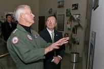 Representative Visit - Jan. 13, 2007 - Adm. Timothy J. Keating, commander of U.S. Northern Command and the North American Aerospace Defense Command, shows U.S. Rep. Doug Lamborn the 9-11 remembrance wall at USNORTHCOM and NORAD headquarters at Peterson Air Force Base, Colo., Jan. 13, 2007. The visit was Lamborn's first to the commands.