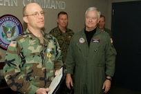 Lt. Col. David M. Funk (left) is awarded the Joint Service Commendation Medal in a Jan. 17, 2007, ceremony at the headquarters of North American Aerospace Defense Command and U.S. Northern Command at Peterson Air Force Base, Colo. Funk was recognized for providing emergency first aid at the scene of a Jan. 8, 2007, three-car accident until professional help arrived. Funk is chief of the Training and Exercise Branch of NORAD and USNORTHCOM. Presenting the award was NORAD and USNORTHCOM commander, Adm. Timothy J. Keating (right). 