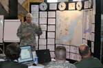 Col. Frank Kosich updates his staff on the status of Exercise Ardent Sentry '07 hurricane recovery operations. Kosich is the Federal Emergency Management Agency Region I Defense Coordinating Officer, whose job is to work with federal, state and local agencies to ensure U.S. Northern Command's Defense Support of Civil Authorities mission is carried out effectively. U.S. Army North provides the DCO to an area affected by a disaster should Department of Defense response be requested by the President or the Secretary of Defense.