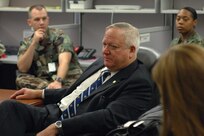 Steven M. Mondul, Director of Security and Emergency Management from the Virginia Department of Emergency Management, briefs Joint Task Force Civil Support members about the role of his agency during a visit at the command’s headquarters.  The Virginia Department of Emergency Management works with local government, state and federal agencies and voluntary organizations to provide resources and expertise in the areas of emergency preparedness, mitigation, response and recovery effort in the event of emergencies and disasters in the state of Virginia.  (Photo by Mass Communication Specialist 