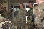 Chief Master Sergeant of the Air Force Rodney McKinley talks with several NORAD and USNORTHCOM senior enlisted personnel during a visit to the commands' headquarters June 6. McKinley received several command briefings and met with the senior enlisted from each service before an all Airmen's call at the Peterson Air Force Base theater.