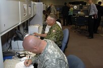 Soldiers from the United States and Canada test new technologies during the Coalition Warrior Interoperability Demonstration June 18. CWID provides the military, state and local as well as international partners use CWID to help ensure the technologies needed during inter-agency operations such as disaster relief go smoothly are truly useful to the operators who would use them should they be needed. 