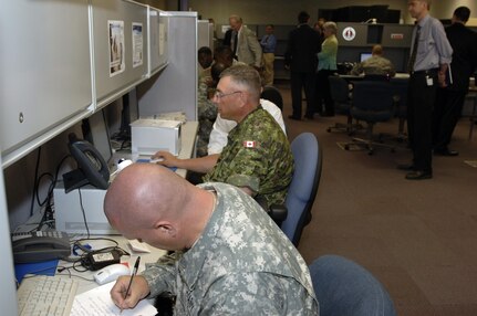 Soldiers from the United States and Canada test new technologies during the Coalition Warrior Interoperability Demonstration June 18. CWID provides the military, state and local as well as international partners use CWID to help ensure the technologies needed during inter-agency operations such as disaster relief go smoothly are truly useful to the operators who would use them should they be needed. 