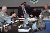 Assistant Secretary of Defense for Homeland Defense Paul McHale, center, participates in a roundtable discussion with the commander and senior leaders of North American Aerospace Defense Command and U.S. Northern Command during an Aug. 28, 2007, visit to the commands' headquarters at Peterson Air Force Base, Colo.
