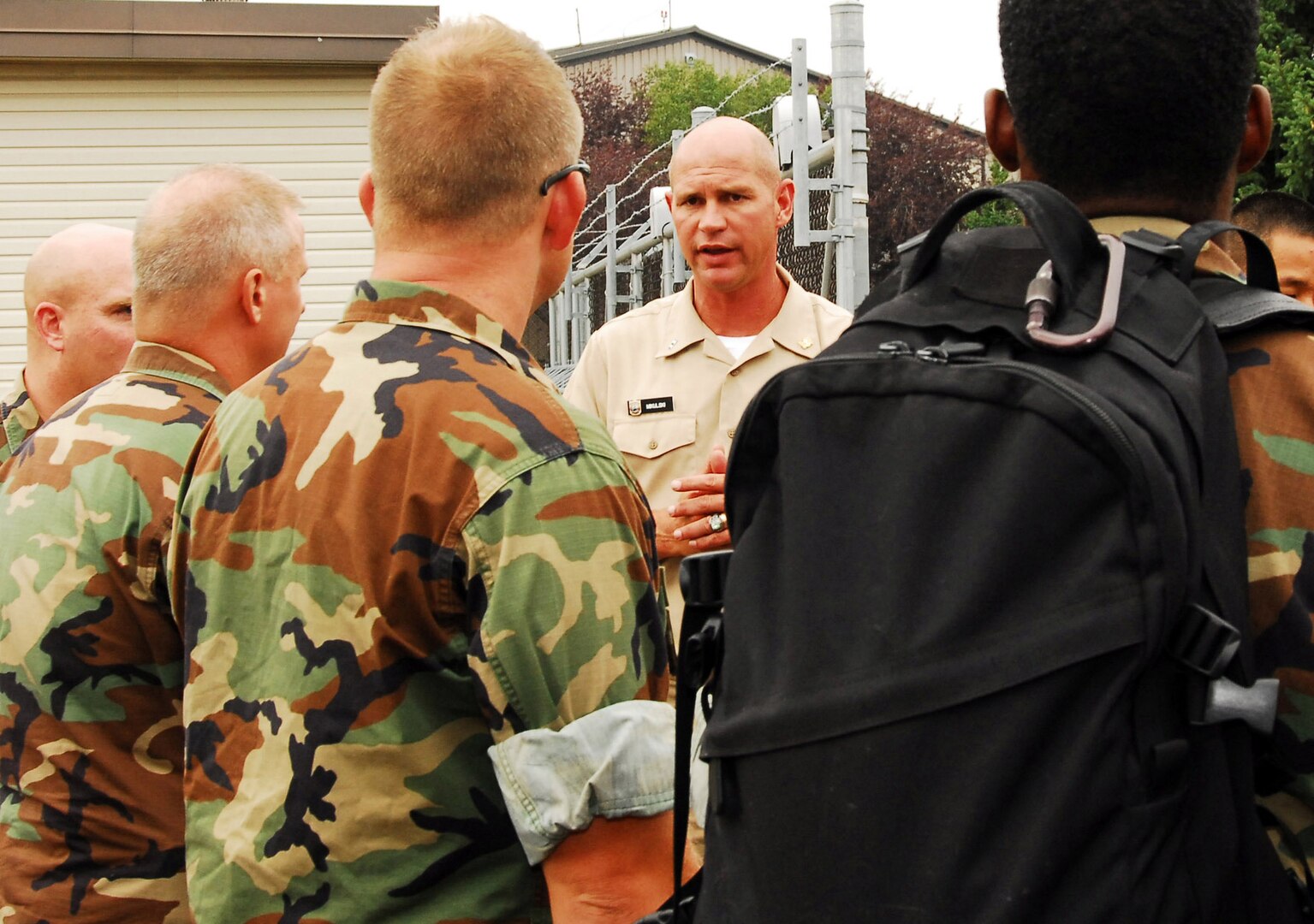 Sailors of Mobile Dive and Salvage Unit 2 (MDSU 2) from Naval Amphibious Base Little Creek are briefed by Warrant Officer Daniel Mikulski of MDSU 2 after arriving at 934th Air Reserve Base Minneapolis Minn. When requested by the primary agency and approved by the Secretary of Defense, MDSU 2 may be utilized in support of civil authorities managing disaster recovery efforts.  