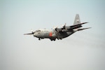 A C-130H Hercules aircraft outfitted with the Modular Aircraft Fire Fighting System (MAFFS)for aerial fire fighting capabilities prepares to land at Channel Islands Air National Guard Station, Camarillo, CA on Nov 20, 2007. The aircraft and crews are on standby in anticipation of expected wildfires in Southern California with the return of the Santa Ana Winds. 