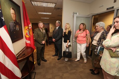 The Marine Corps Information Operations Center (MCIOC) dedicates it's new building, Walt Hall, to General Lewis W. Walt on  April 19, 2013 at Marine Corps Base Quantico, Quantico, Va. Gen. Walt was designated in 1968 as the first four-star Assistant Commandant of the Marine Corps and is recognized as a pioneer in Marine Corps information operations. (Official U.S. Marine Corps photo by Sgt. Kristofer Atkinson/Released)