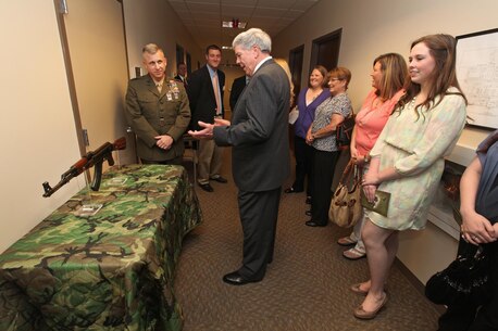 The Marine Corps Information Operations Center (MCIOC) dedicates it's new building, Walt Hall, to General Lewis W. Walt on  April 19, 2013 at Marine Corps Base Quantico, Quantico, Va. Gen. Walt was designated in 1968 as the first four-star Assistant Commandant of the Marine Corps and is recognized as a pioneer in Marine Corps information operations. (Official U.S. Marine Corps photo by Sgt. Kristofer Atkinson/Released)