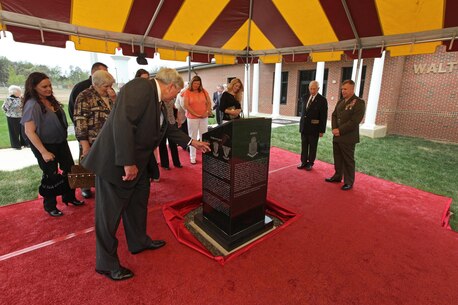 The Marine Corps Information Operations Center (MCIOC) dedicates it's new building, Walt Hall, to General Lewis W. Walt on  April 19, 2013 at Marine Corps Base Quantico, Quantico, Va. Gen. Walt was designated in 1968 as the first four-star Assistant Commandant of the Marine Corps and is recognized as a pioneer in Marine Corps information operations. (Official U.S. Marine Corps photo by Sgt. Kristofer Atkinson/Released)