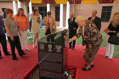 The Marine Corps Information Operations Center (MCIOC) dedicates it's new building, Walt Hall, to General Lewis W. Walt on  April 19, 2013 at Marine Corps Base Quantico, Quantico, Va. Gen. Walt was designated in 1968 as the first four-star Assistant Commandant of the Marine Corps and is recognized as a pioneer in Marine Corps information operations. (Official U.S. Marine Corps photo by Sgt. Kristofer Atkinson/Released)