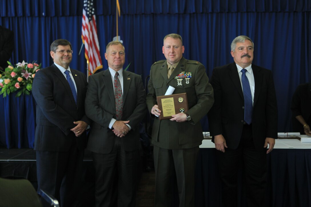 Chief Warrant Officer 2 Chris Frazier, the deputy inspector general for 4th Marine Aircraft Wing, was recognized in the category of outstanding junior grade military officer at the Federal Executive Board Distinguished Service Awards luncheon at the NASA Michoud Assembly Facility here, May 8. The luncheon was a part of New Orleans Public Service Recognition week, sponsored by the New Orleans mayor’s office. (U.S. Marine Corps photo by Lance Cpl. Tiffany Edwards/Released)