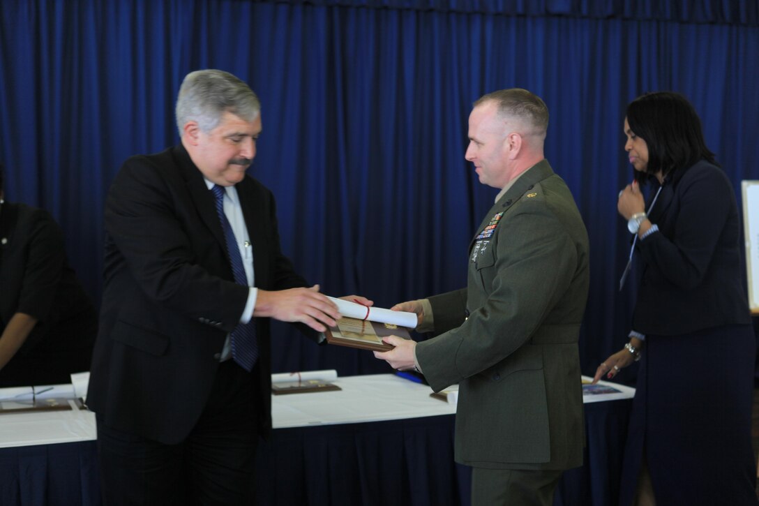Major William S. Chairsell, the operations officer for the 4th Marine Logistics Group, was recognized in the category of outstanding field grade military officer at the Federal Executive Board Distinguished Service Awards luncheon at the NASA Michoud Assembly Facility here, May 8. The luncheon was a part of New Orleans Public Service Recognition week, sponsored by the New Orleans mayor’s office. (U.S. Marine Corps photo by Lance Cpl. Tiffany Edwards/Released) 