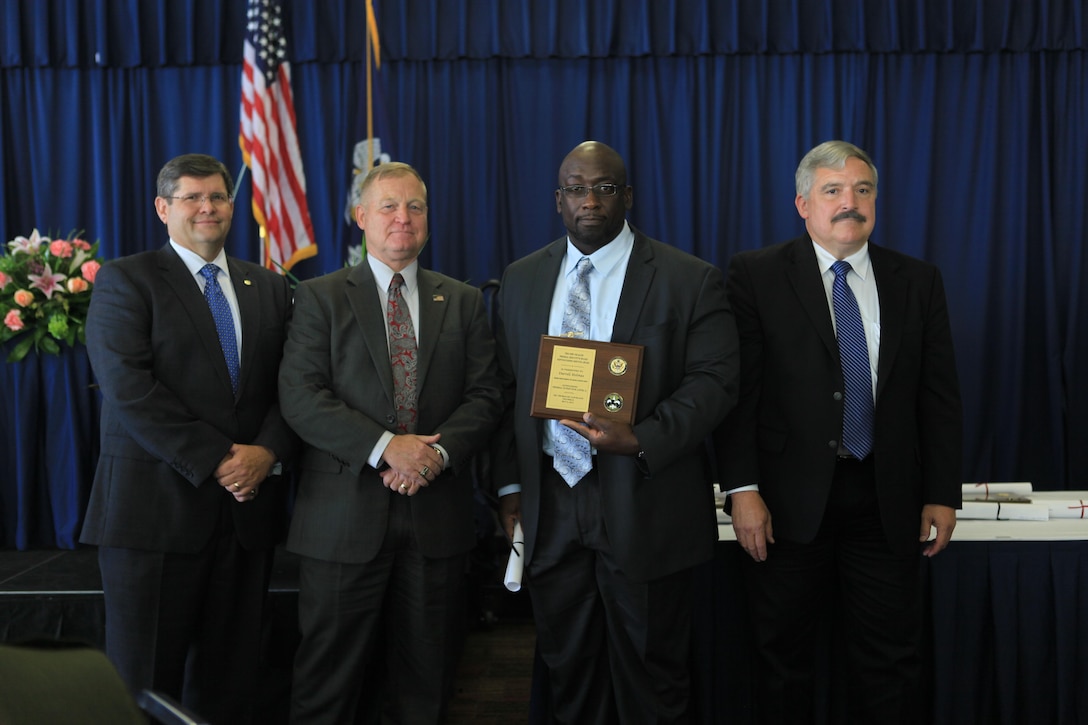 Darrell Holmes, the 4th Marine Logistics Group program analyst, was recognized in the category of outstanding federal supervisor level 1 at the Federal Executive Board Distinguished Service Awards luncheon at the NASA Michoud Assembly Facility here, May 8. The luncheon was a part of New Orleans Public Service Recognition week, sponsored by the New Orleans mayor’s office. (U.S. Marine Corps photo by Lance Cpl. Tiffany Edwards/Released)