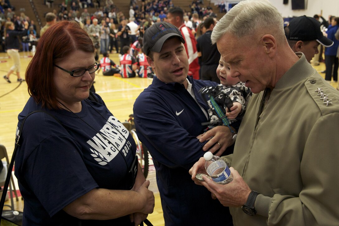 The 35th Commandant of the Marine Corps, General James F. Amos, attends the 2013 Wounded Warrior Games at the U.S. Olympic Training Center in Colorado Springs, CO., May 11, 2013. (U.S. Marine Corps photo by Sgt. Mallory S. VanderSchans)(RELEASED)
