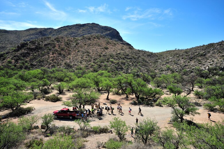 Participants take a break at the halfway point of the hike at Colossal Caves Mountain Park, Ariz., May 11, 2013. The Hike consisted of six miles of rough terrain.(U.S. Air Force photo by Airman 1st Class Josh Slavin/Released)