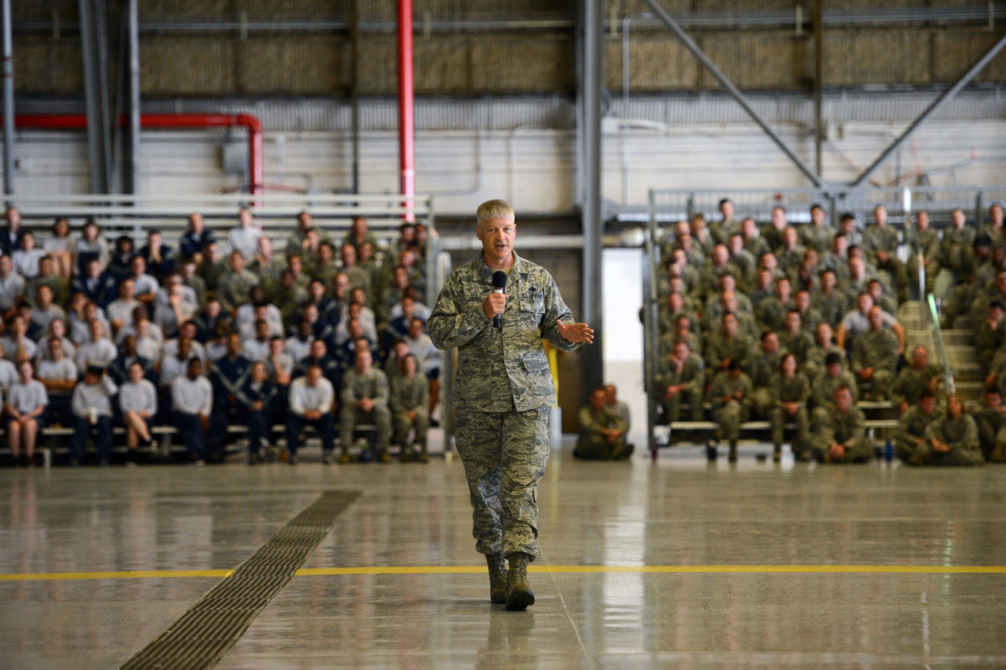 Chief Master Sgt. Gordon Drake, 62nd Airlift Wing command chief, shares a life experience May 10, 2013 during Wingman Day at Joint Base Lewis-McChord, Wash. Drake emphasized the importance of physical fitness. (U.S. Air Force photo/Staff Sgt. Jason Truskowski)
