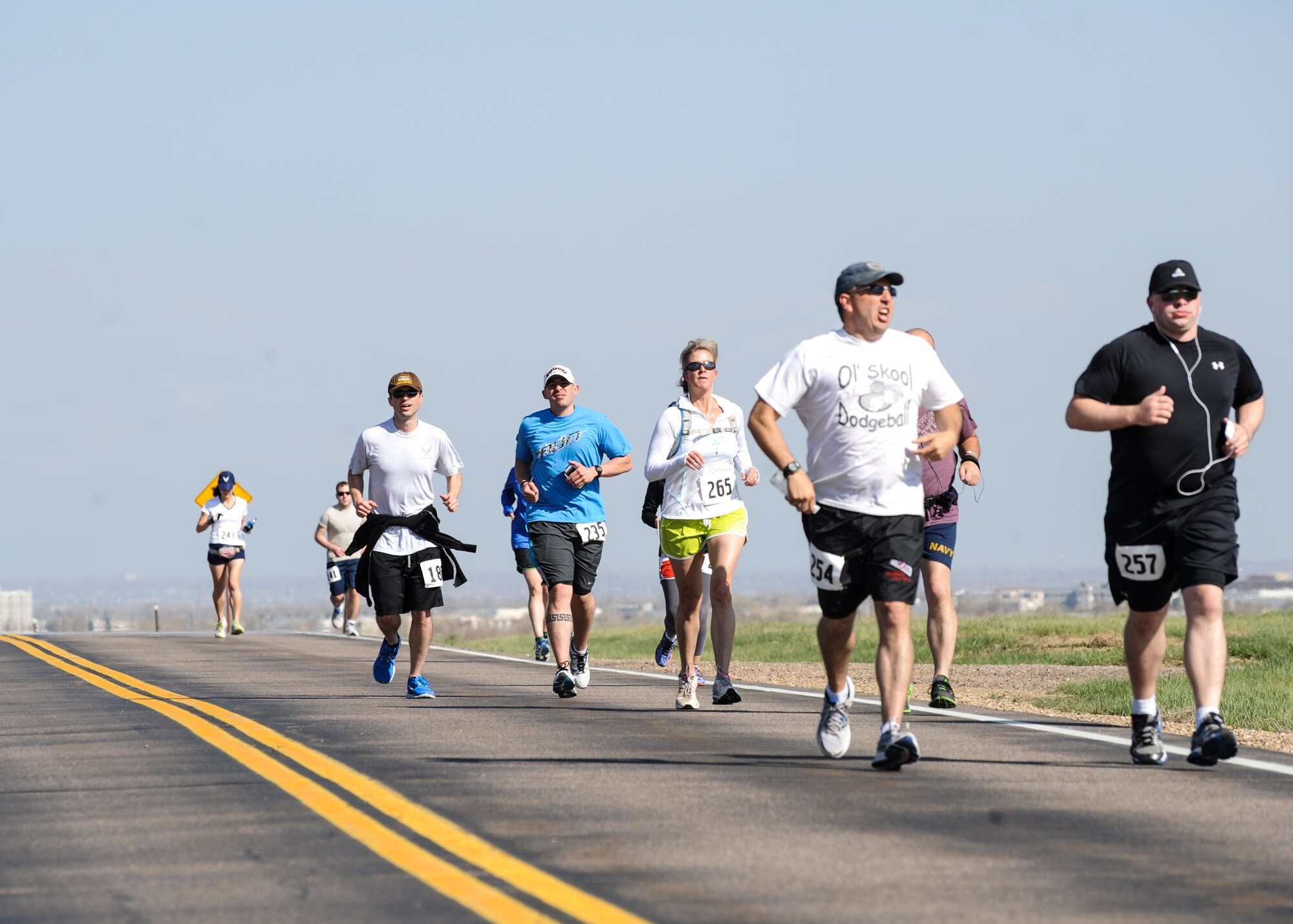 Runners finish the first of 13.1 miles during the 7th Annual Buckley Half Marathon May 11, 2013, on Buckley Air Force Base, Colo. About 50 runners participated in the run. (U.S. Air Force photo by Staff Sgt. Christopher Gross/Released)