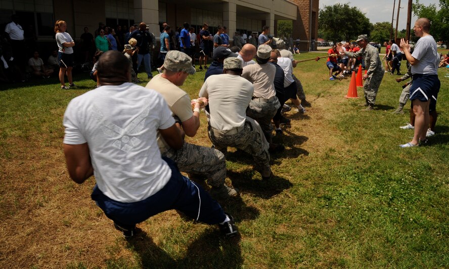 Barksdale Airmen play tug-of-war during Sports Day on Barksdale Air Force Base, La., May 10, 2013. Sports Day is an annual event that gives Airmen the opportunity to participate in several individual and team sports to boost morale and camaraderie. (U.S. Air Force photo/Airman 1st Class Andrew Moua)