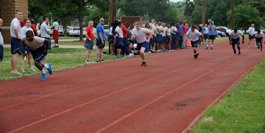 Barksdale Airmen participate in the 1.5 mile relay during Sports Day on Barksdale Air Force Base, La., May 10, 2013. Sports Day consisted of various team events including dodgeball, basketball, soccer, tug-of-war, volleyball, a homerun derby and racquetball. This day was designed to improve teamwork and help increase the awareness of fitness, sports programs and boost morale. (U.S. Air Force photo/Airman 1st Class Andrew Moua)