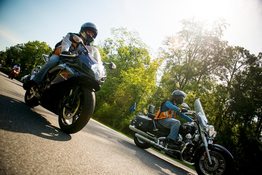 Motorcycle riders head off base during the first-ever Air Force Assistance Fund (AFAF) Motorcycle Ride Fundraiser May 10, 2013, at Moody Air Force Base, Ga. Sixty-six riders and passengers rode through Ray City, Nashville and Tifton, Ga., traveling a total of 137 miles in support of the AFAF. (U.S. Air Force photo by Staff Sgt. Jamal D. Sutter/Released) 