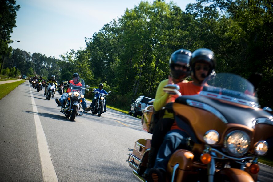 Motorcycle riders head off base during the first-ever Air Force Assistance Fund Motorcycle Ride Fundraiser May 10, 2013, at Moody Air Force Base, Ga. The group rode to Tifton, Ga., and back, traveling a total of 137 miles. (U.S. Air Force photo by Staff Sgt. Jamal D. Sutter/Released) 