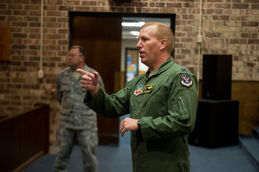U.S. Air Force Col. Steven Ramer, 23d Wing vice commander, gives opening remarks before a Quilts of Valor Foundation presentation May 8, 2013, at Moody Air Force Base, Ga. Quilters from the local community visited base to present quilts to five Purple Heart Medal recipients. (U.S. Air Force photo by Staff Sgt. Jamal D. Sutter/Released)