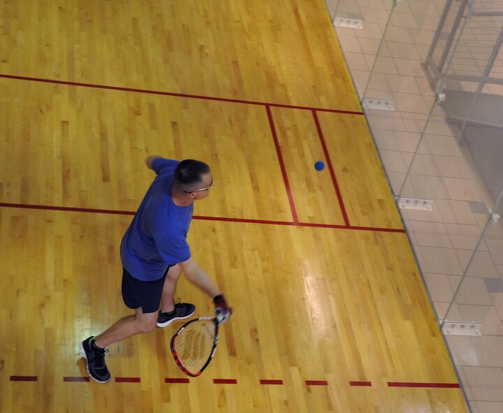 A Barksdale Airman prepares to hit a racquetball during Sports Day 2013 on Barksdale Air Force Base, La., May 10, 2013. Sports Day gave Airmen the opportunity to compete against other squadrons in friendly competition to build teamwork and increase the awareness of fitness. (U.S. Air Force photo/Airman 1st Class Benjamin Gonsier)
