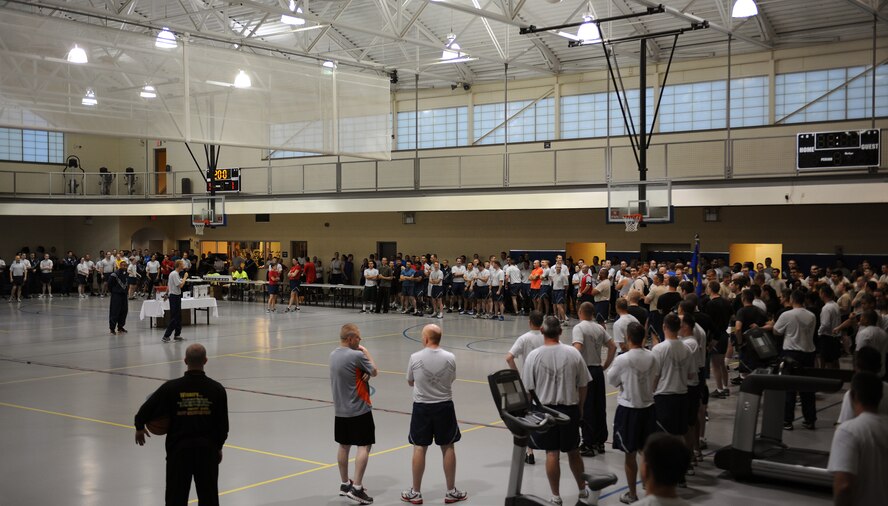 Barksdale Airmen attend the opening remarks for Sports Day 2013 on Barksdale Air Force Base, La., May 10, 2013. Sports day is an annual event that gave Airmen the opportunity to participate in several individual and team sports to boost morale and camaraderie. (U.S. Air Force photo/Airman 1st Class Benjamin Gonsier)