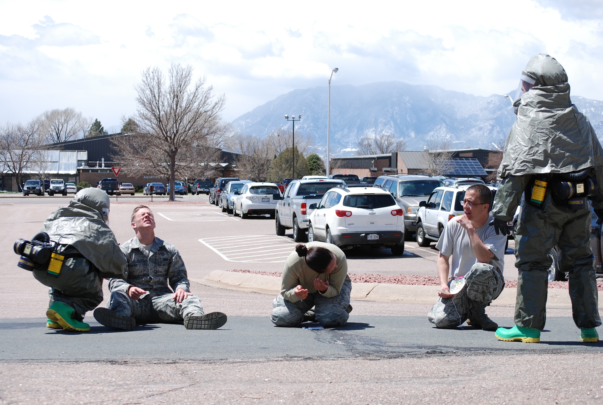 Maintaining security is a high priority to keep others from being contaminated until a cause can be properly indentified. Here, personnel from the 21st Medical Group maintained security and control of the patients as the decontamination tent was set up. (U.S. Air Force photo/Michael Golembesky)
