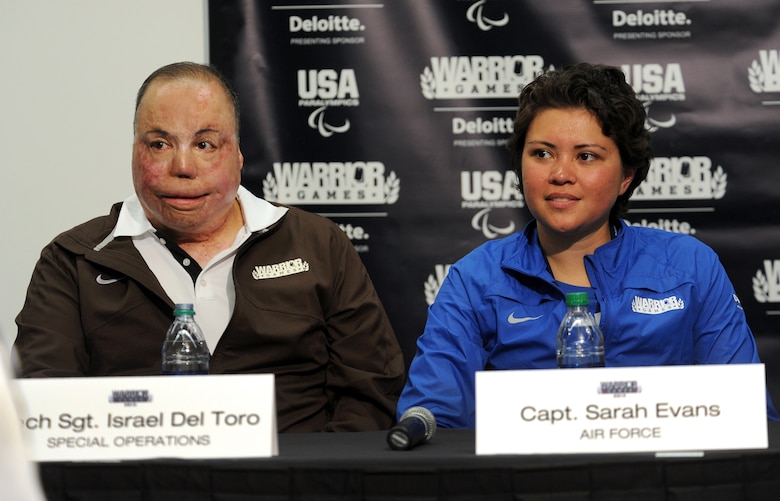 Capt. Sarah Evans and Tech. Sgt. Israel Del Toro answer questions during a press conference held in conjunction with the opening ceremonies of the 2013 Warrior Games at the U.S. Olympic Training Center in Colorado Springs, Colo., May 11, 2013. Evan competes for the Air Force team and Del Toro will be representing U.S. Special Operations Command. From May 11-16, more than 200 wounded, ill and injured servicemembers and veterans from the U.S. Marines, Army, Air Force and Navy, as well as a team representing U.S. Special Operations Command and an international team representing the United Kingdom, will compete in track and field, shooting, swimming, cycling, archery, wheelchair basketball and sitting volleyball at the U.S. Olympic Training Center and U.S. Air Force Academy. (U.S. Air Force photo/Chief Master Sgt. John A. Zincone)