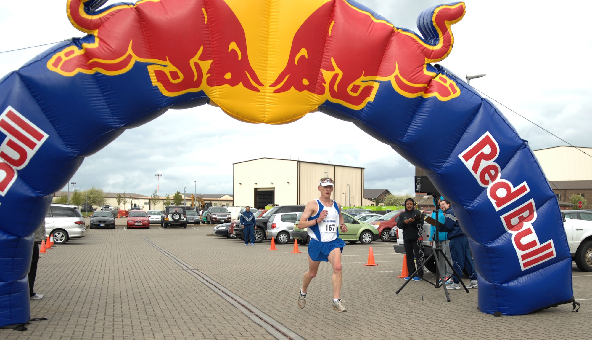 Lt. Col. Christopher Bennett, 100th Operations Support Squadron commander, finishes a half-marathon May 11, 2013, on RAF Mildenhall, England. Bennett came in first place with a final time of 1:20:25. (U.S. Air Force photo by Airman 1st Class Dillon Johnston/Released)