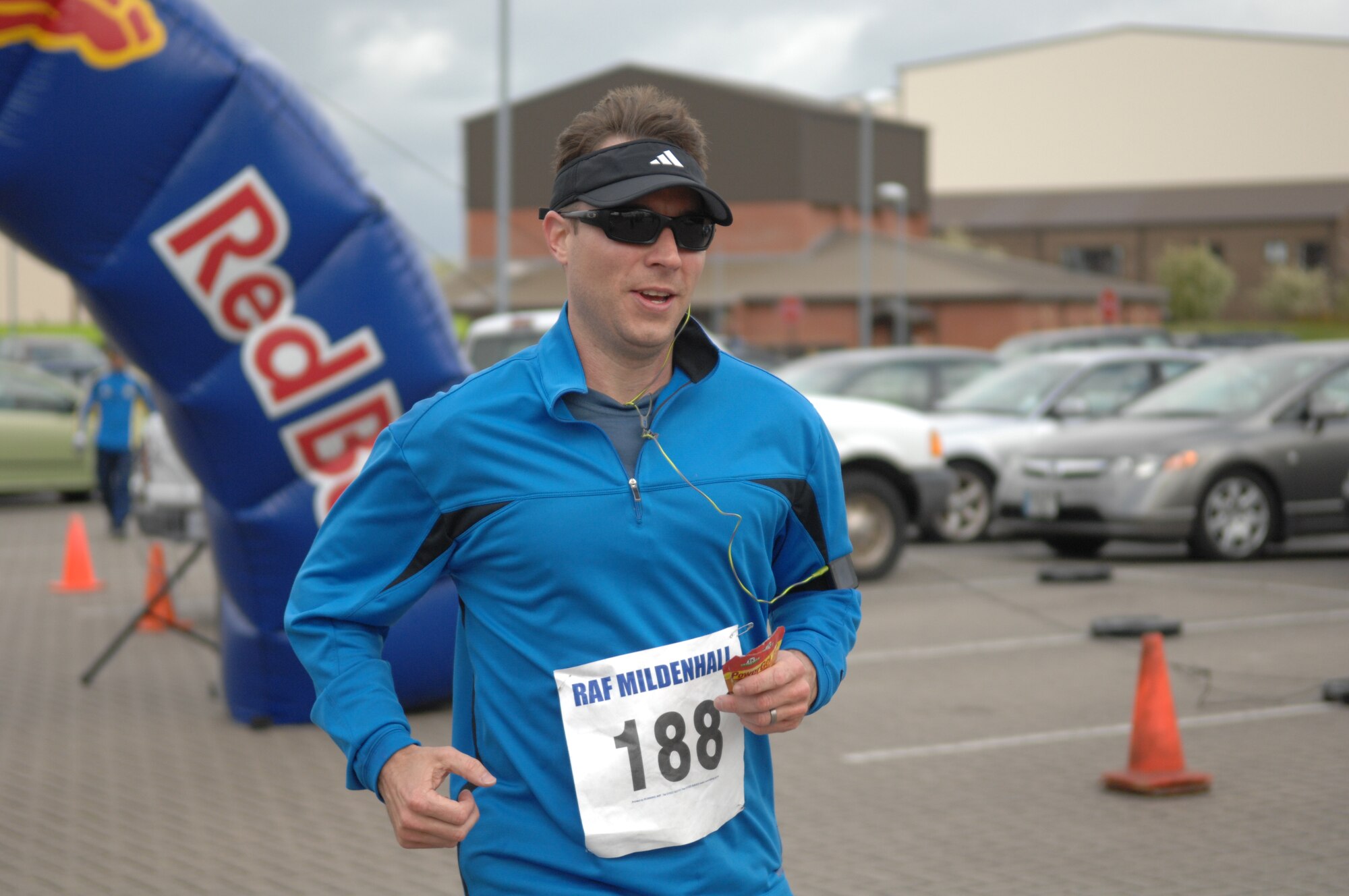 Master Sgt. Corey Blackburn, 48th Force Support Squadron Installation Personnel Readiness section chief from RAF Lakenheath, England, completes his first lap of a half-marathon May 11, 2013, on RAF Mildenhall, England. The half-marathon consisted of two laps around the base perimeter. (U.S. Air Force photo by Airman 1st Class Dillon Johnston/Released)
