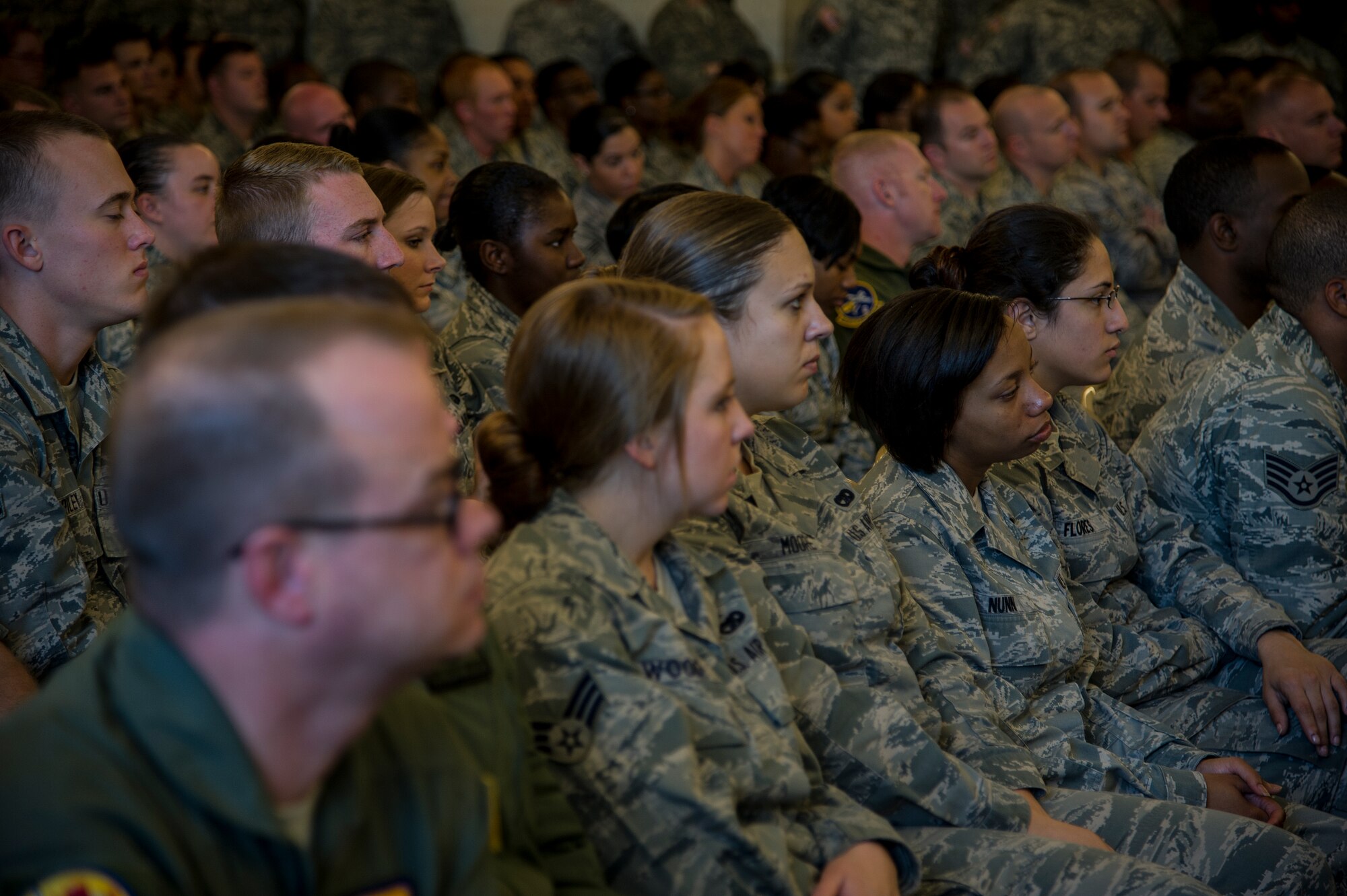 Airmen listen to Chief Master Sgt. of the Air Force James Cody speak May 9, 2013, at the Charleston Club at Joint Base Charleston-Air Base, S.C. Cody talked about sequestration, potential changes to the enlisted evaluation system, and the idea of using a board to select Airmen for promotion to the rank of master sergeant. (U.S. Air Force photo/Staff Sgt. Rasheen Douglas)
