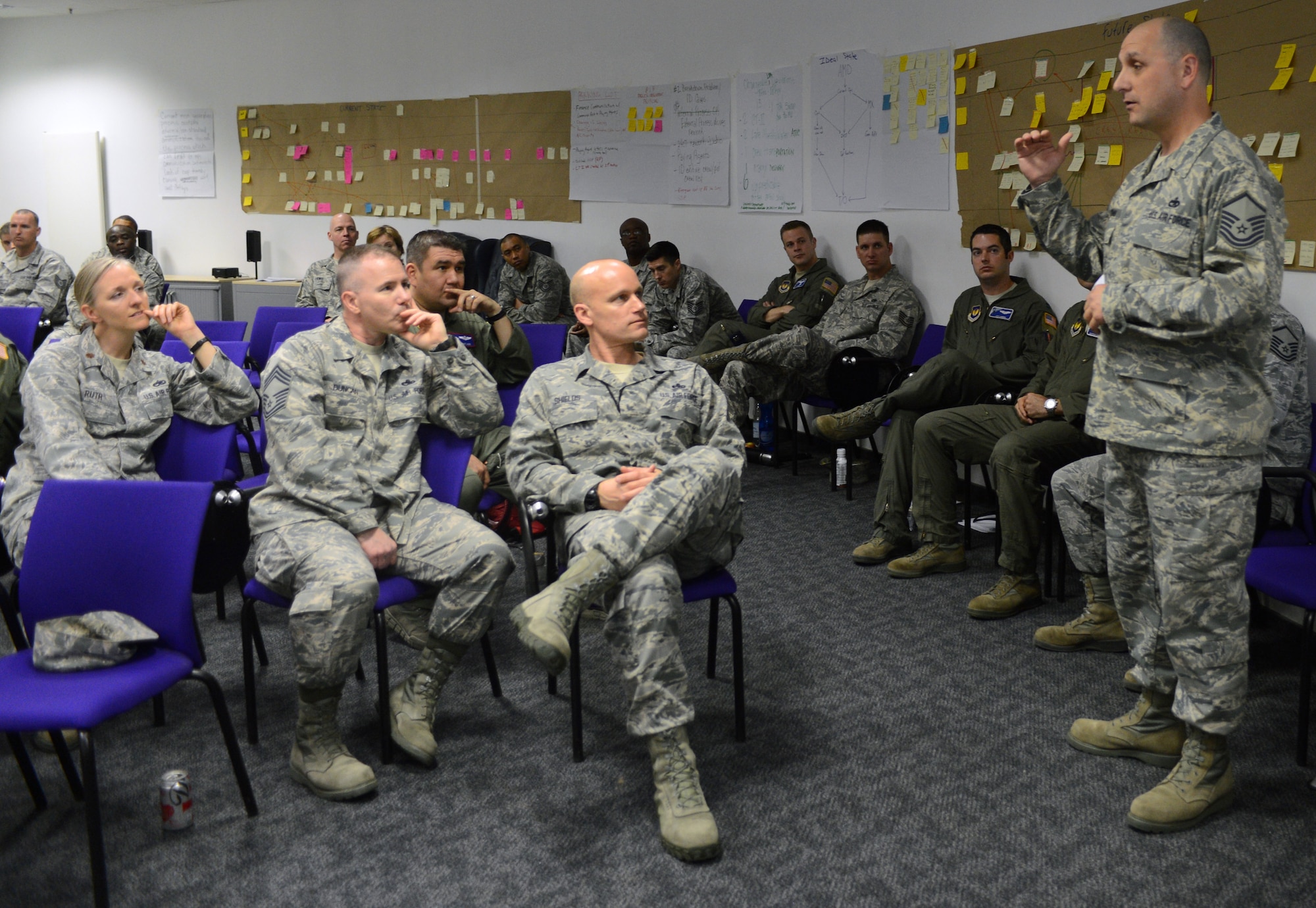 Airmen receive a briefing on Air Force Smart Operations for the 21st century, May 10, 2013, Ramstein Air Base, Germany. AFSO21 focuses on improving mission capabilities to become more efficient across the Air Force. (U.S. Air Force photo/Senior Airman Caitlin O’Neil-McKeown)