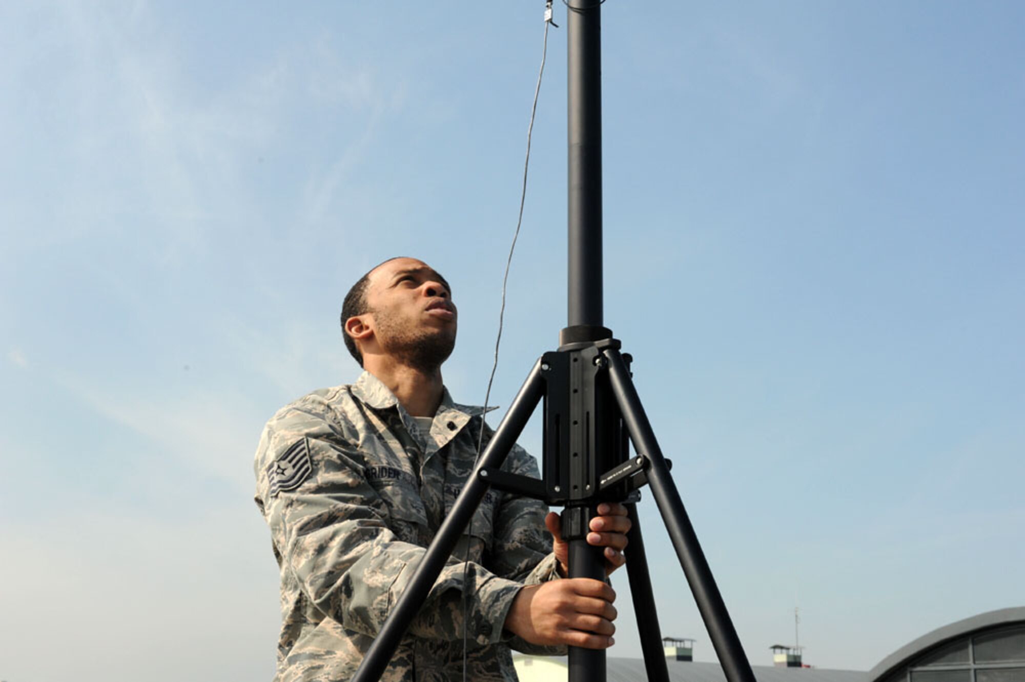 LASK AIR BASE, Poland - U.S. Air Force Tech. Sgt. Curtis Grider, 606th Air Control Squadron command and control battle management operator, assembles the base of a Battlefield Operations Support System (BOSS). This system acts as a 'translator' allowing coalition aircraft to talk to each other during simulated air combat scenarios. The U.S. and Poland's continuing contributions to develop and improve air readiness are significant in maintaining security and building partnerships. (U.S. Air Force photo by Tech. Sgt. Kenya Shiloh/RELEASED)