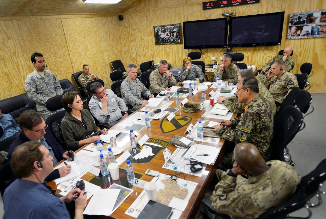 U.S. Deputy Defense Secretary Ash Carter listens closely to Afghanistan ...