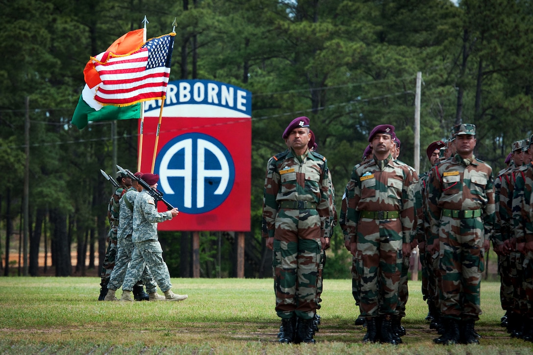 A coalition color guard marches off the 82nd Airborne Division parade field after the conclusion of the opening ceremony of Yudh Abhyas 2013, the annual training event between the U.S. and Indian armies on Fort Bragg, N.C., May 3, 2013. 